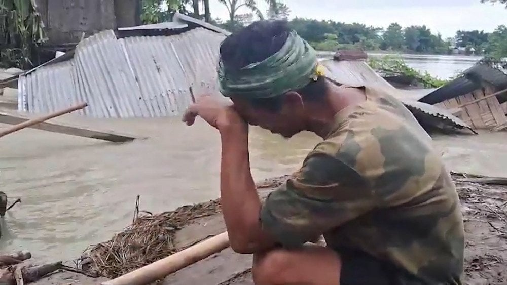 flood victims in India, flood in Assam, flood damage in Assam