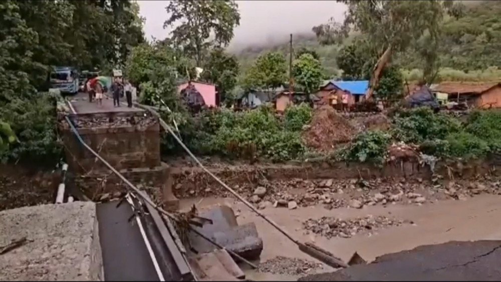 flood in India, bridge destruction India, flood in Uttarakhand state