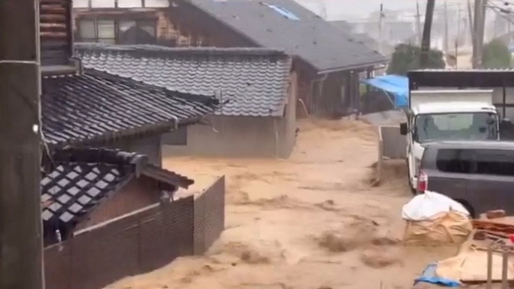 Typhoon Pulasan in Japan, record rainfall in Japan, flooding in Japan, flooding in Ishikawa, Yamagata high-speed trains