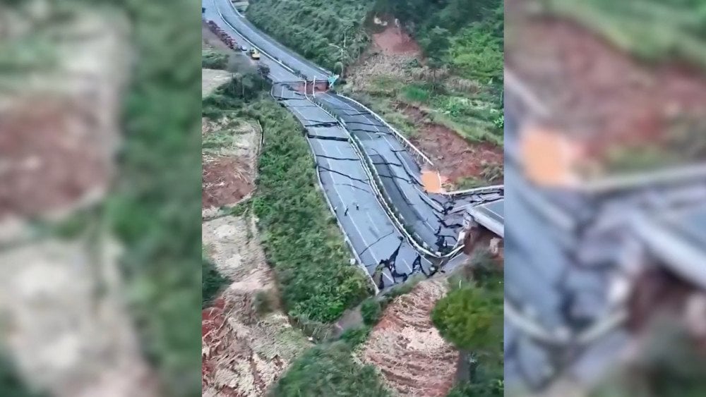 Downpours in China, heavy rain in China, road collapse in China, road damaged in China